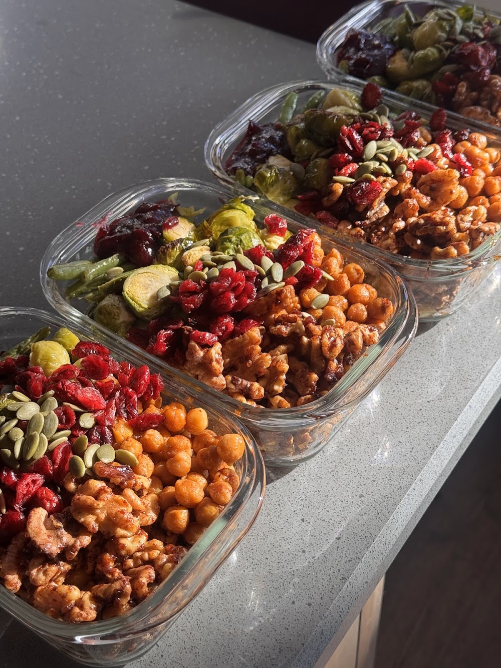 Harvest bowls with roasted vegetables, chickpeas and cranberries